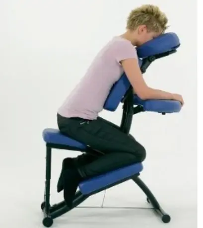 A person sitting in an ergonomic chair with their head on the back of it.
