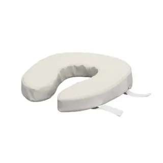 A white toilet seat cushion with two ties.