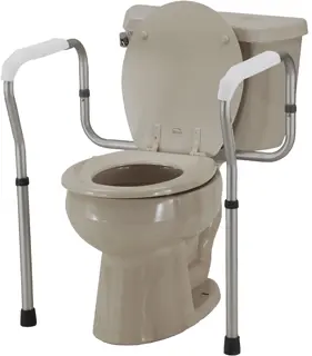 A toilet with a metal frame around it.